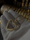 Rolex heart pendant